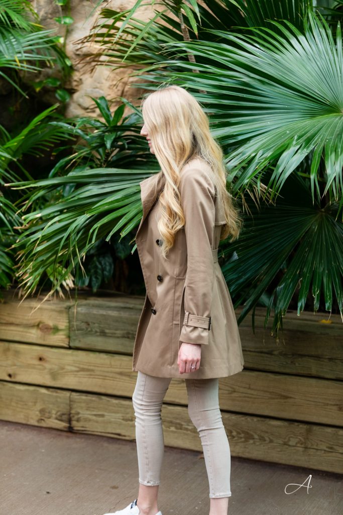 beige trench coat and beige jeans